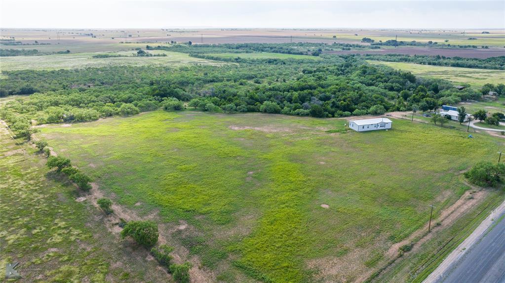 801 Highway 153 Wingate, TX 79566 - Photo 22 of 39 a view of a lush green field