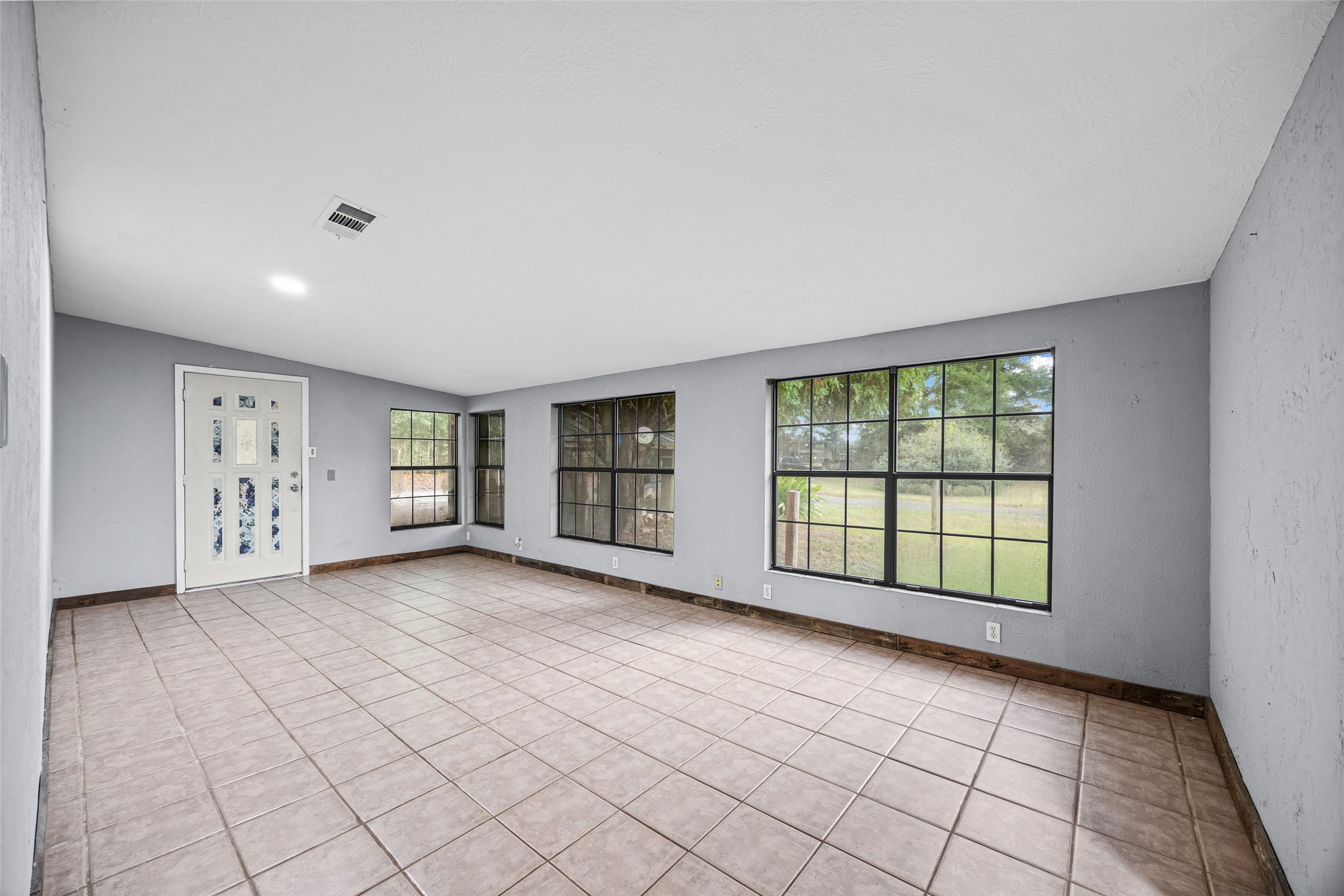 577 County Road 138 Jasper, TX 75951 - Photo 11 of 45 a view of an empty room with a window