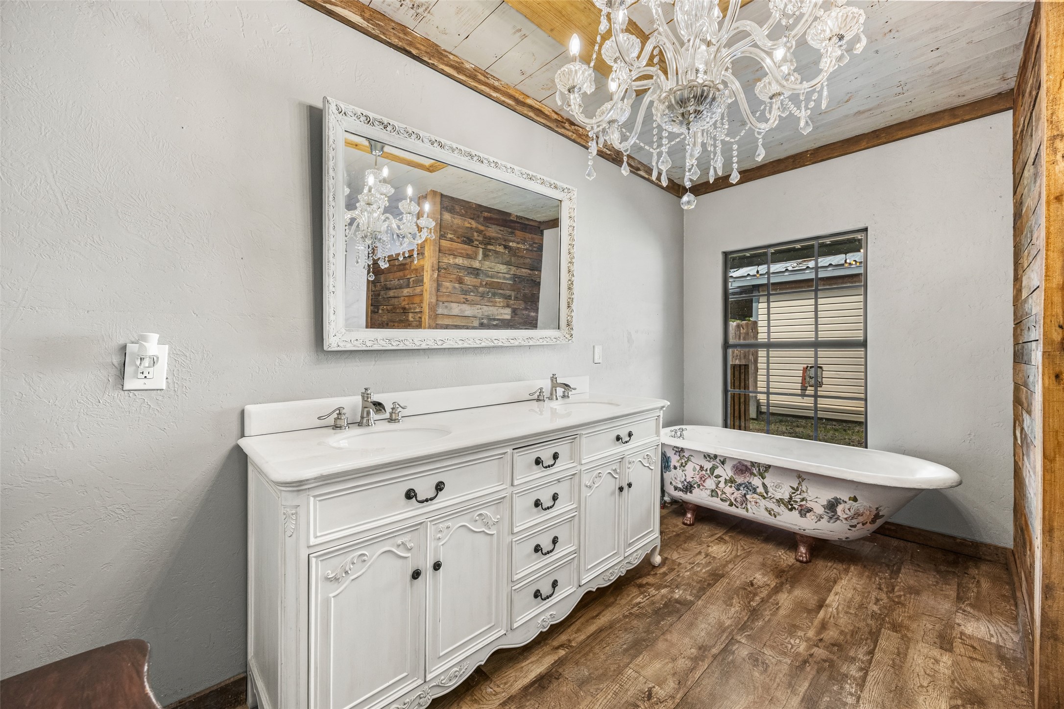577 County Road 138 Jasper, TX 75951 - Photo 18 of 45 a bathroom with a double vanity sink and a mirror
