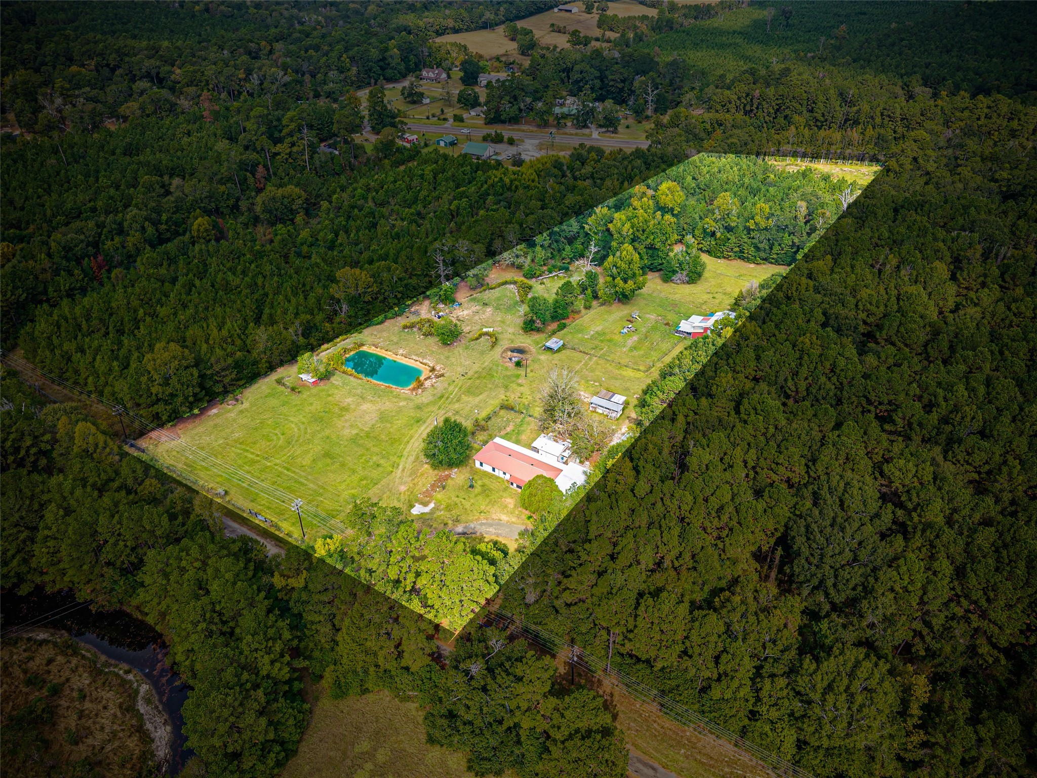 577 County Road 138 Jasper, TX 75951 - Photo 2 of 45 a view of a back yard of the house