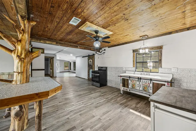 a view of a bathroom from a hallway