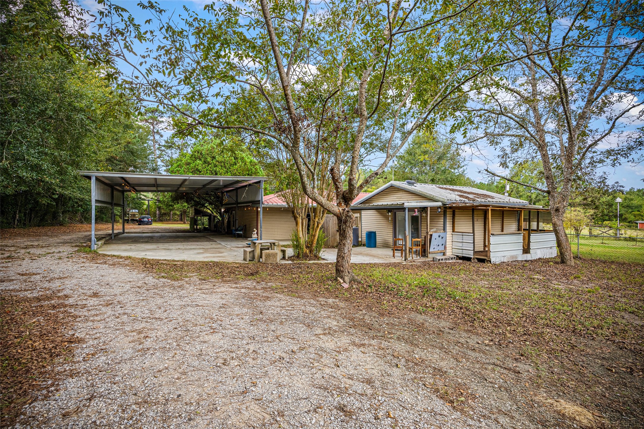 577 County Road 138 Jasper, TX 75951 - Photo 34 of 45 a view of a house with a yard