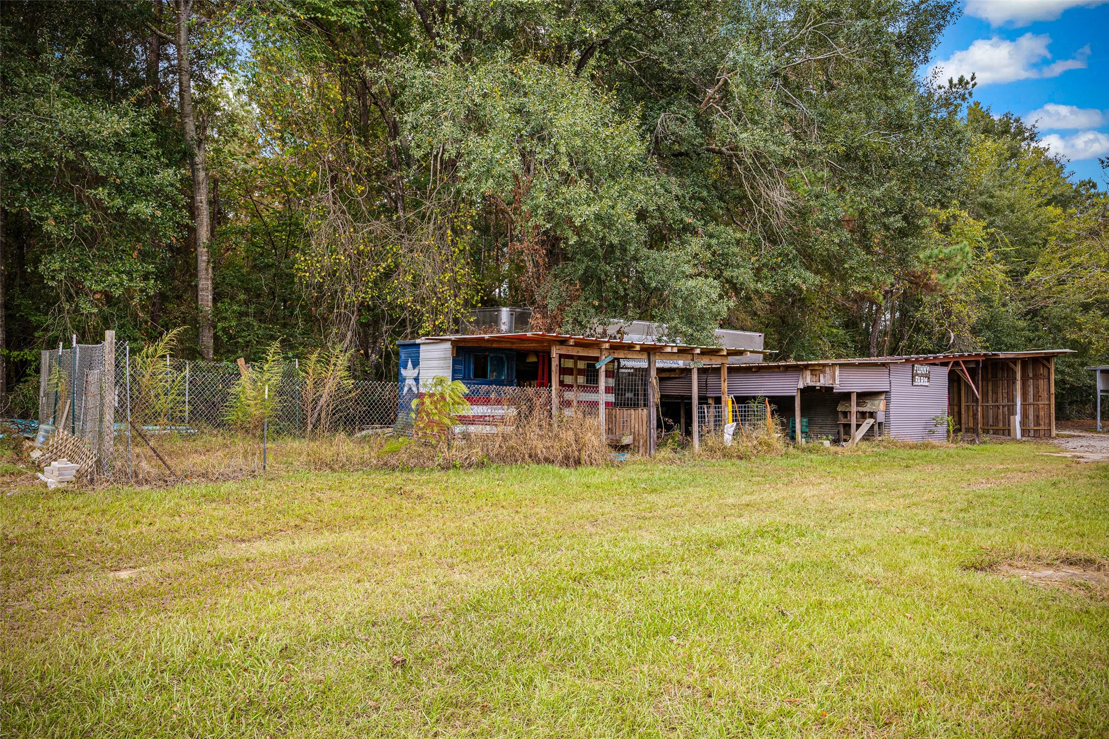 577 County Road 138 Jasper, TX 75951 - Photo 38 of 45 a view of a house with a backyard