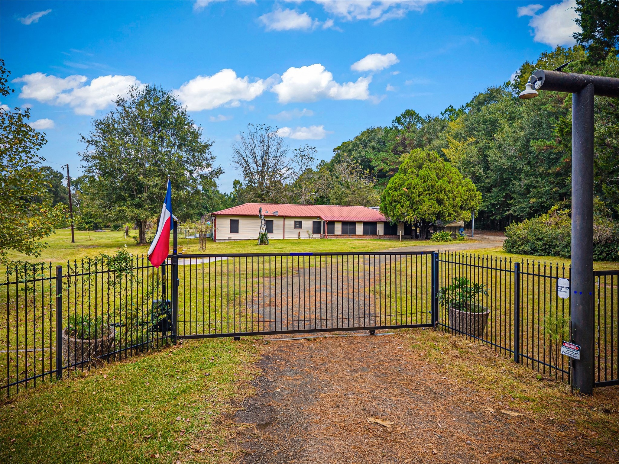 577 County Road 138 Jasper, TX 75951 - Photo 6 of 45 a view of a wrought iron fences in front of house