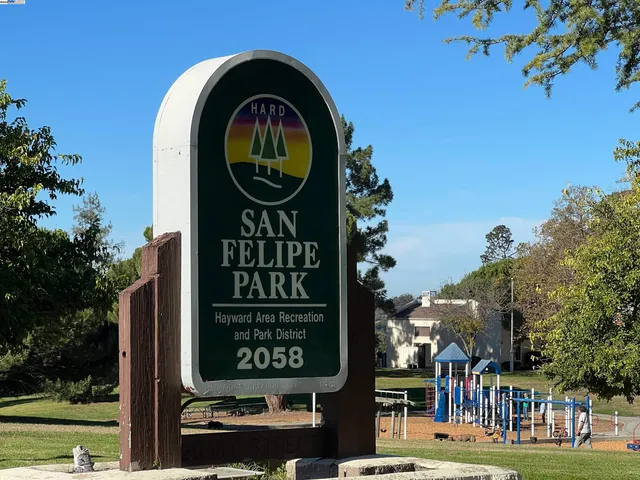 a sign on a pole on a street