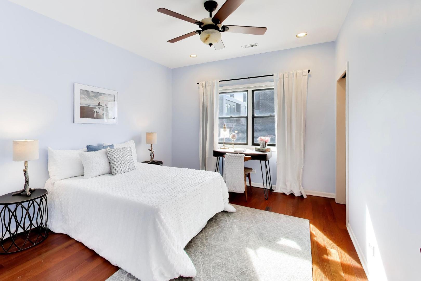 1532 West Fry Street, Unit 3 Chicago, IL 60642 - Photo 26 of 36 a bedroom with a bed and a window