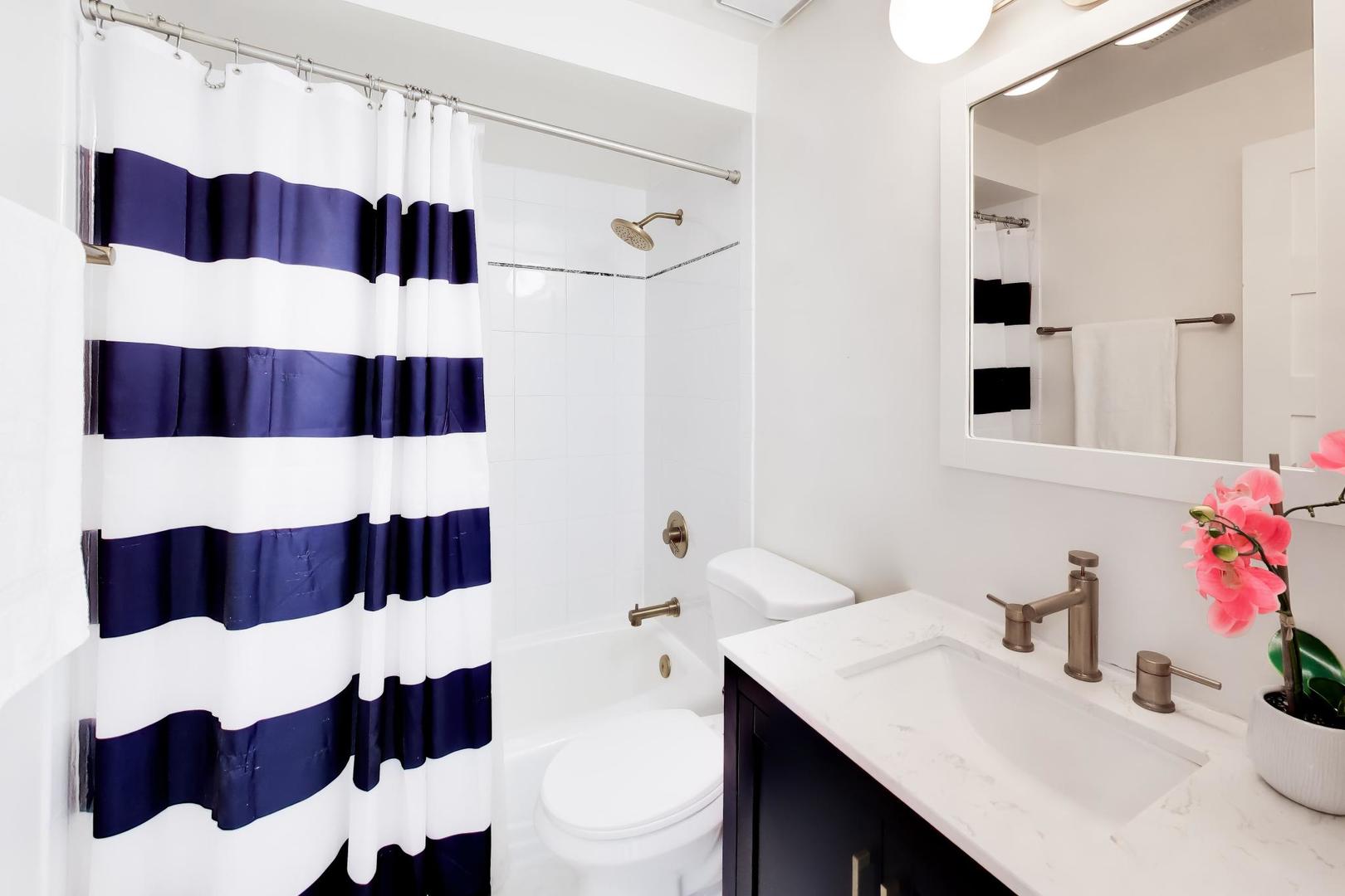 1532 West Fry Street, Unit 3 Chicago, IL 60642 - Photo 29 of 36 a bathroom with a sink and a mirror