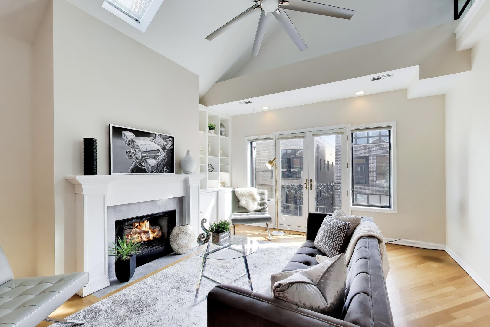 1532 West Fry Street, Unit 3 Chicago, IL 60642 - Photo 4 of 36 a living room with furniture and a fireplace