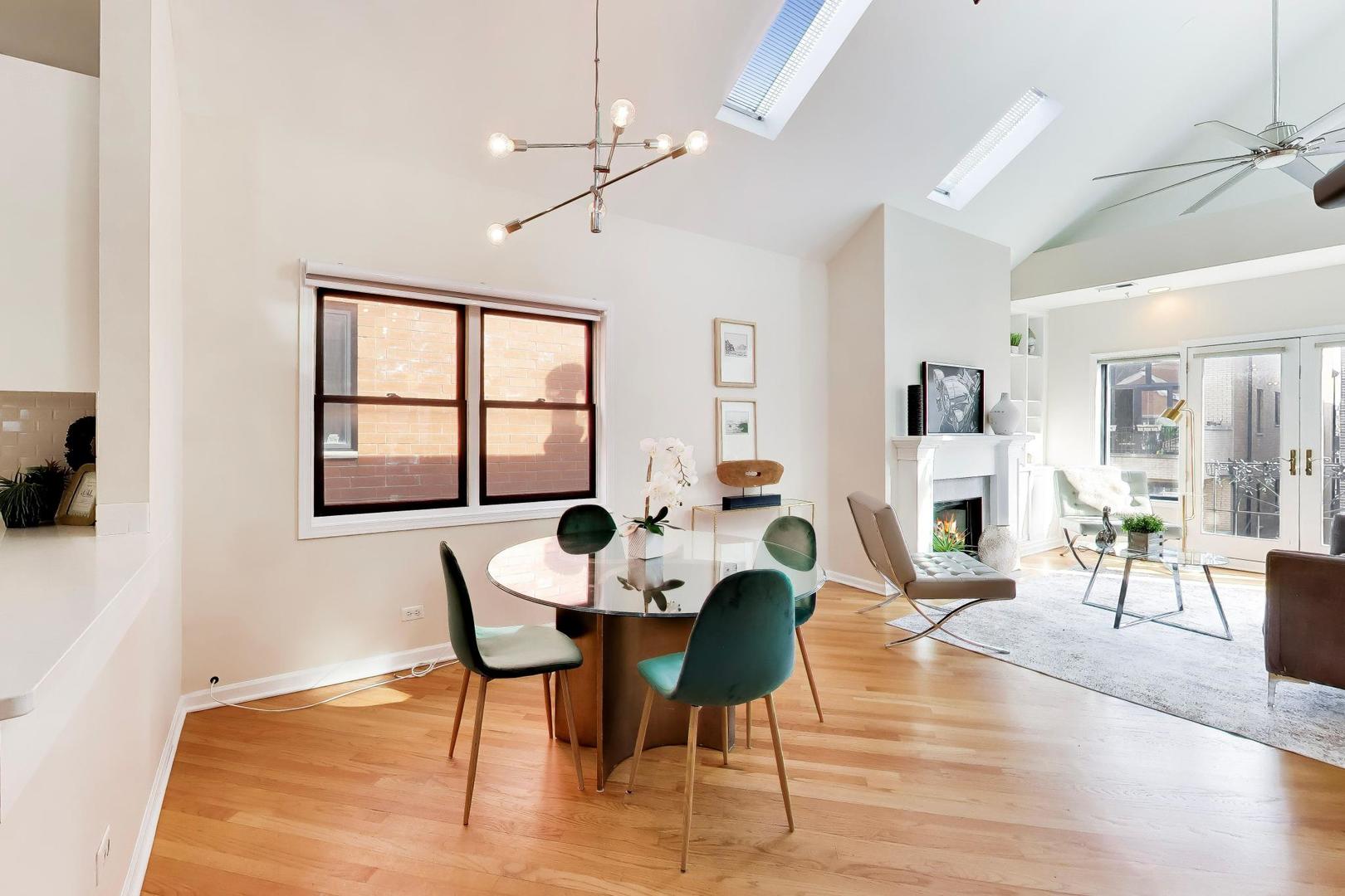 1532 West Fry Street, Unit 3 Chicago, IL 60642 - Photo 6 of 36 a view of a dining room with furniture and wooden floor