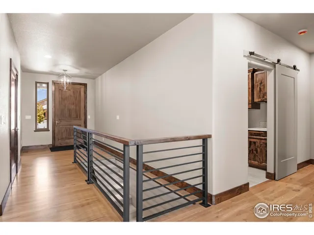 a bathroom with a sink a faucet a potted plant and a shower