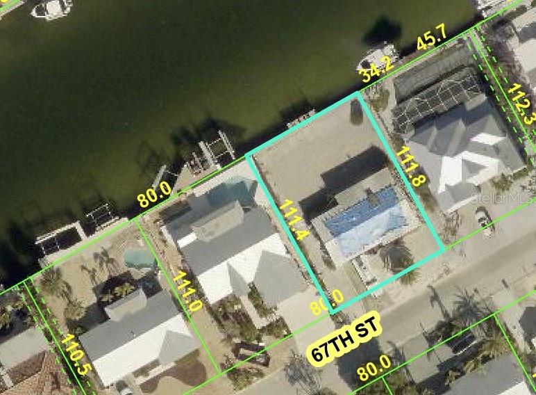 526 67th Street Holmes Beach, FL 34217 - Photo 5 of 6 an aerial view of a house