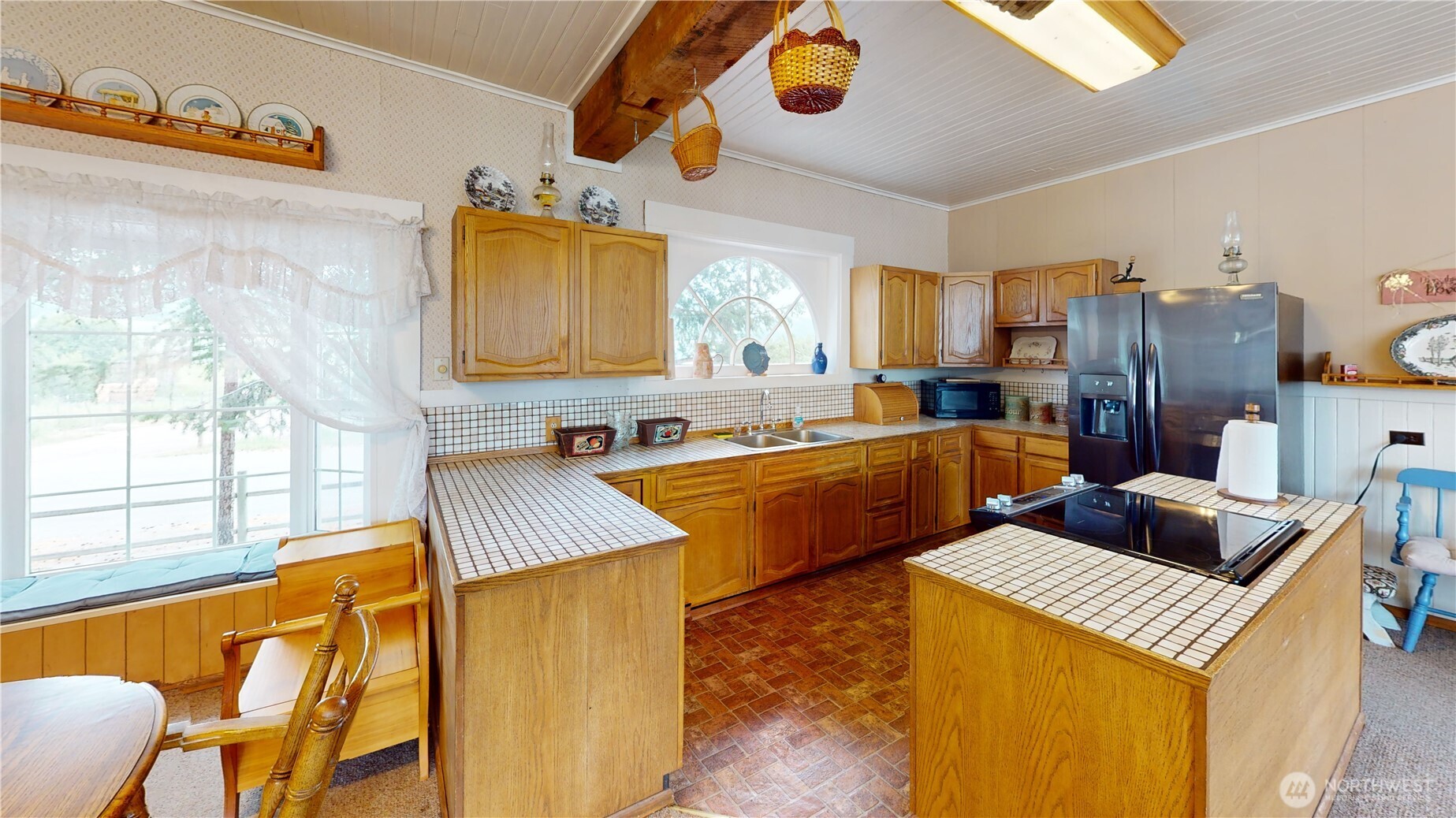 7 Lost Lake Road Oroville, WA 98844 - Photo 11 of 31 a kitchen with a refrigerator and a stove