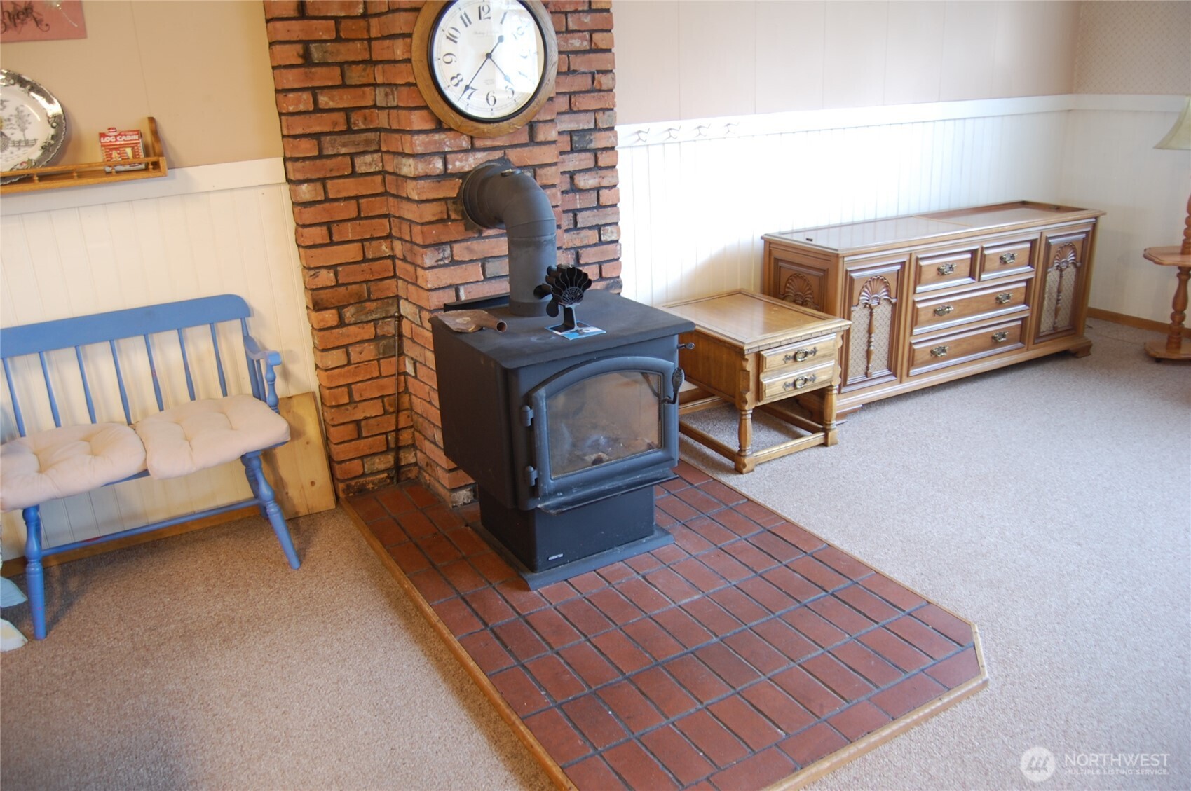 7 Lost Lake Road Oroville, WA 98844 - Photo 14 of 31 a bedroom with bed and a chandelier