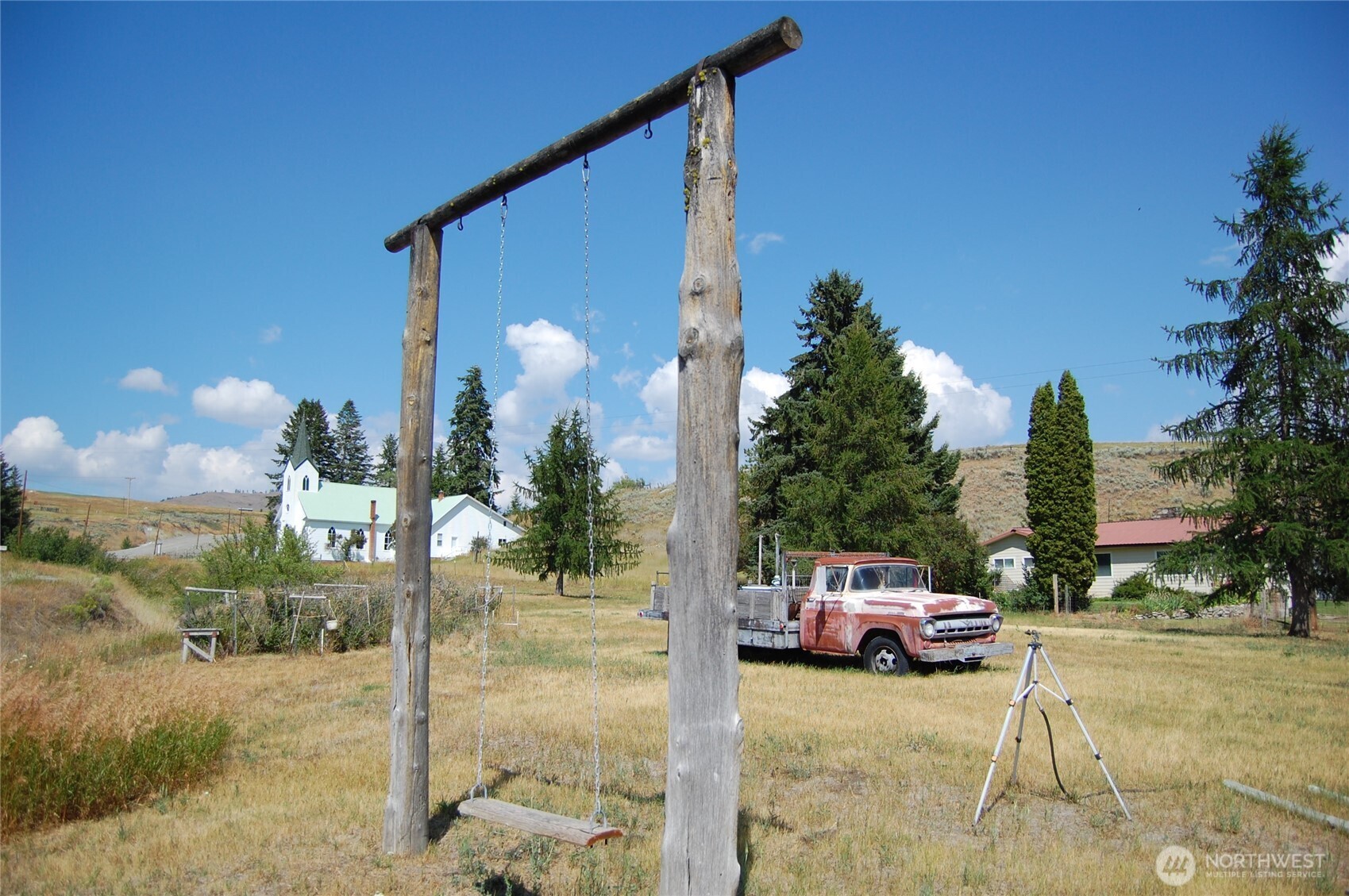 7 Lost Lake Road Oroville, WA 98844 - Photo 26 of 31 a view of a car parked in front of a house