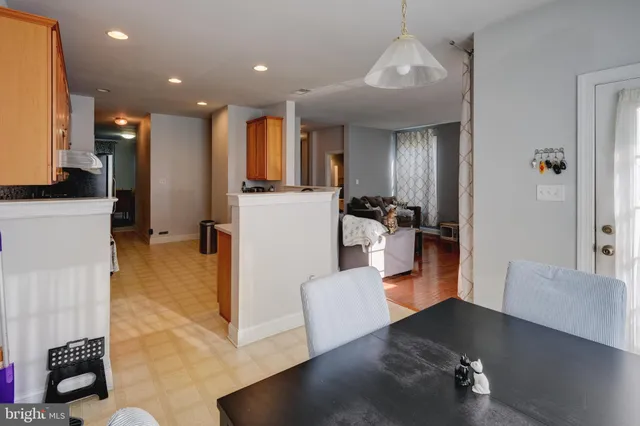 a view of a living room and dining room