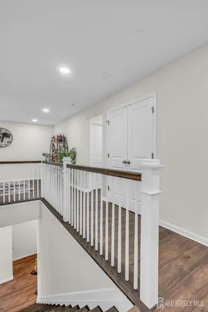 a view of entryway with wooden floor