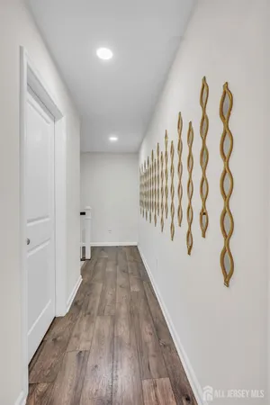 a view of entryway with wooden floor