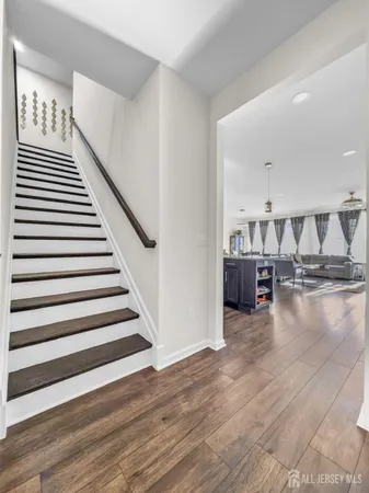 a view of a livingroom with wooden floor