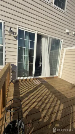 a view of a backyard with sitting area