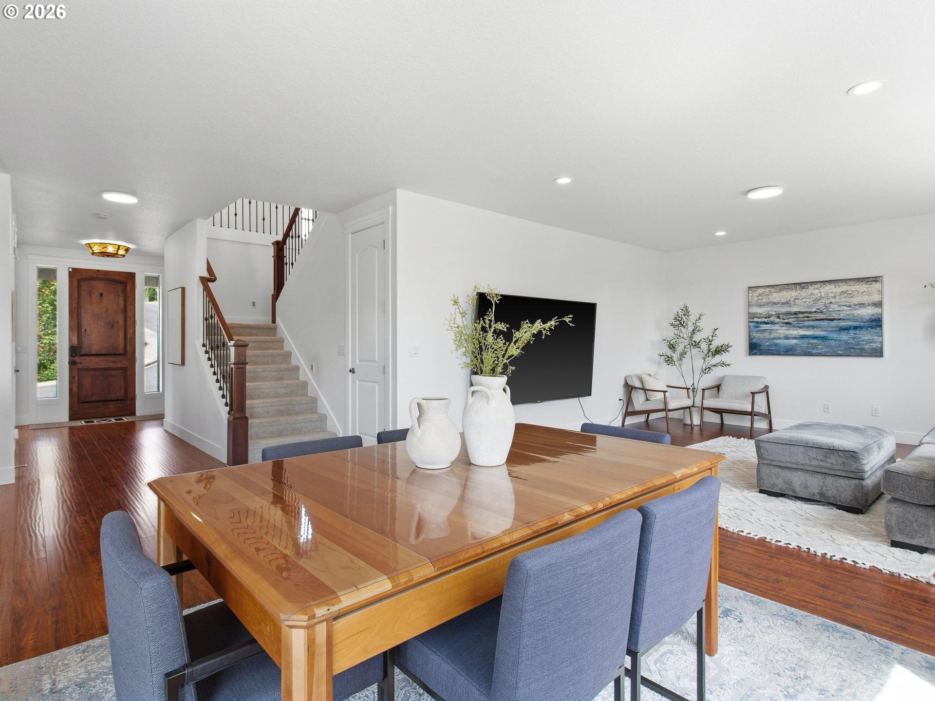 1012 Northwest Goodwin Street Camas, WA 98607 - Photo 13 of 44 a dining room with furniture and wooden floor