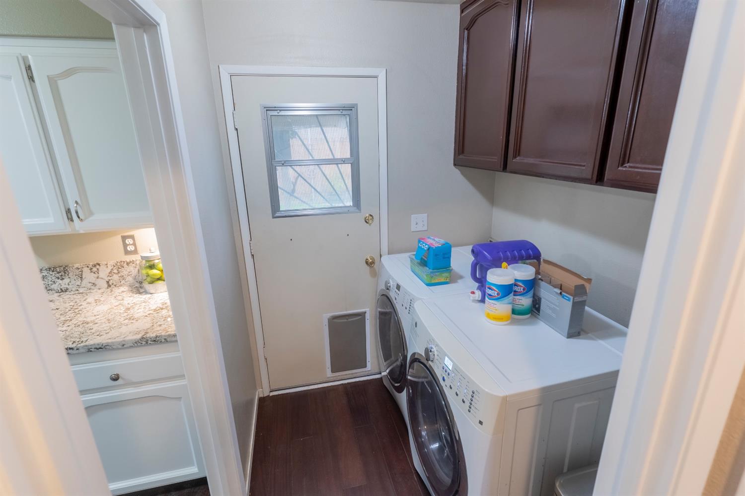 1607 Ashlan Avenue Clovis, CA 93611 - Photo 15 of 17 a utility room with dryer and washer
