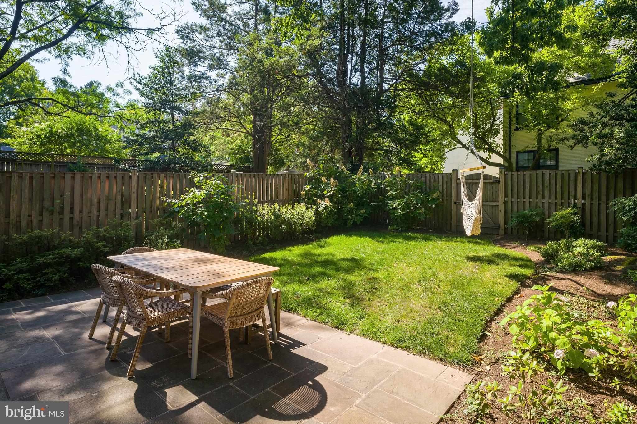 3812 Garfield Street Northwest Washington, DC 20007 - Photo 33 of 43 Flagstone patio in fenced backyard