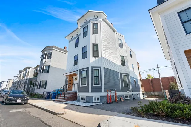 a car parked in front of a building