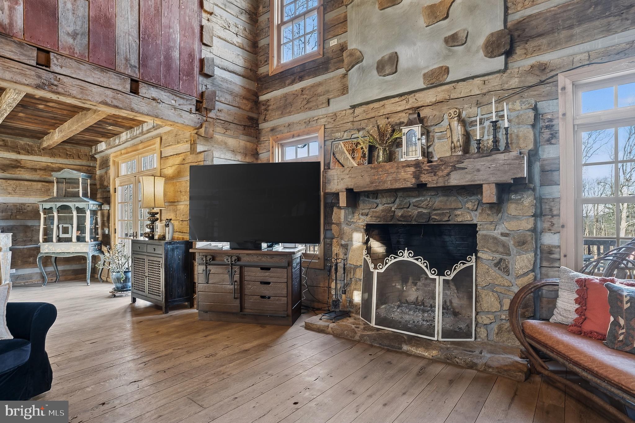 201 Pine Swamp Road Elverson, PA 19520 - Photo 8 of 60 a living room with furniture and a fireplace