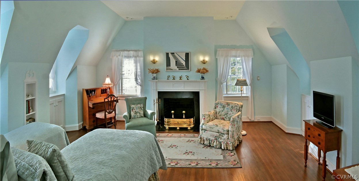 8899 River Road Henrico, VA 23229 - Photo 17 of 50 a living room with furniture and a fireplace