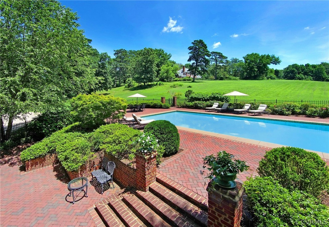 8899 River Road Henrico, VA 23229 - Photo 37 of 50 a view of a lake with a yard