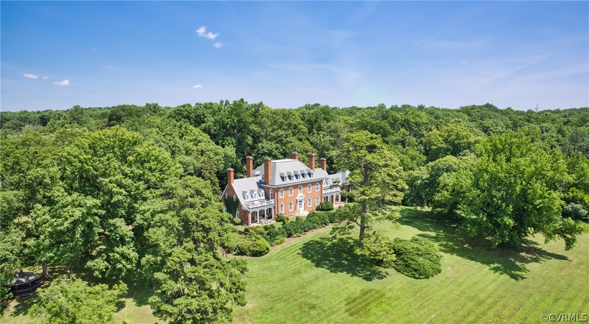 8899 River Road Henrico, VA 23229 - Photo 4 of 50 a picture of a big yard