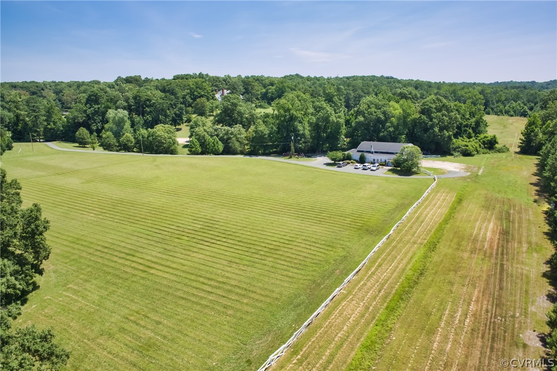8899 River Road Henrico, VA 23229 - Photo 42 of 50 a view of a swimming pool with a yard