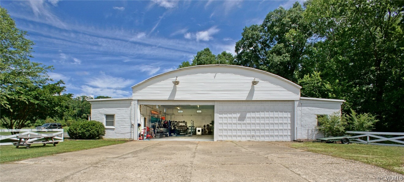 8899 River Road Henrico, VA 23229 - Photo 43 of 50 a view of a house with a patio