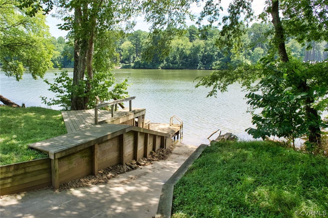 8899 River Road Henrico, VA 23229 - Photo 46 of 50 a view of a swimming pool with a patio