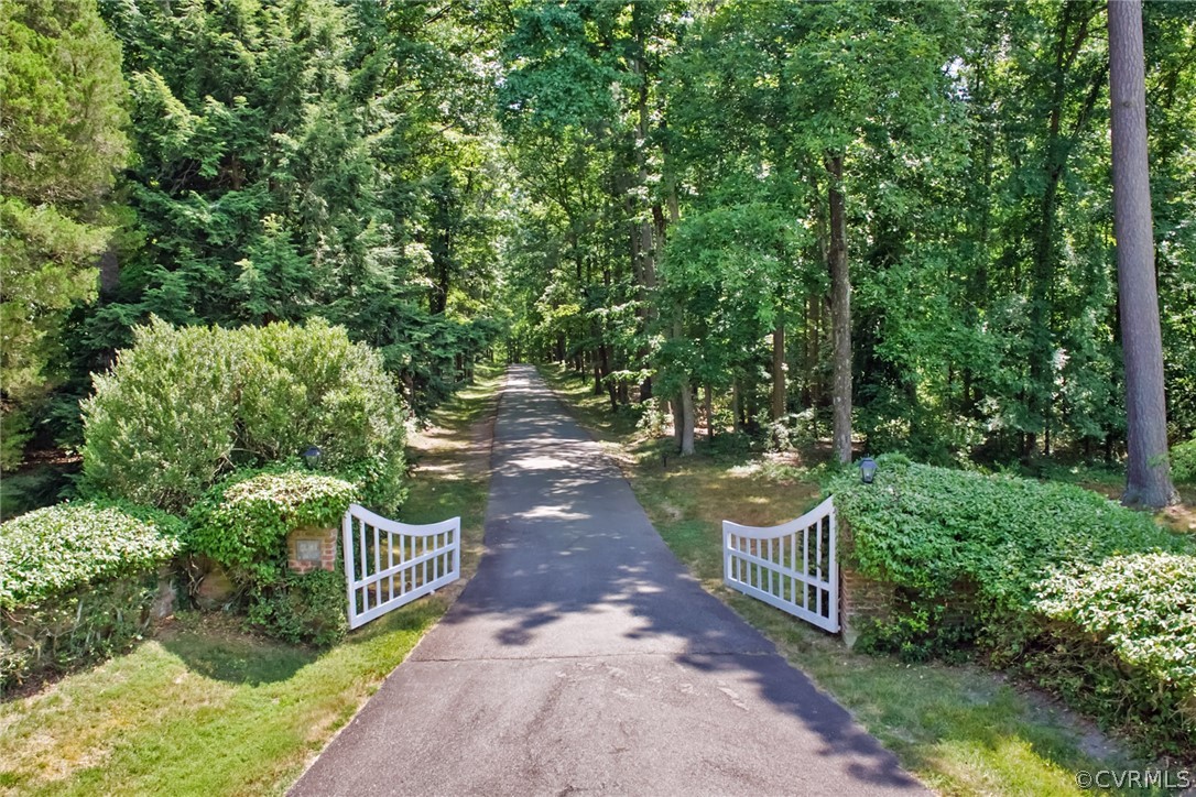 8899 River Road Henrico, VA 23229 - Photo 50 of 50 a view of a pathway with a garden