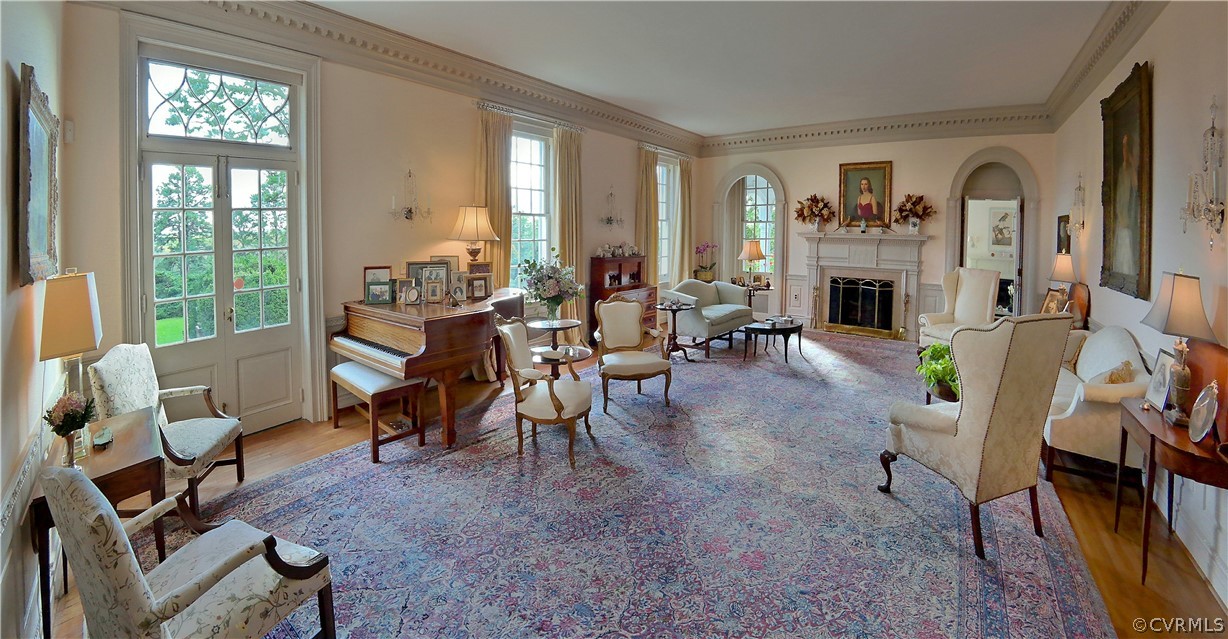 8899 River Road Henrico, VA 23229 - Photo 7 of 50 a living room with furniture and a fireplace