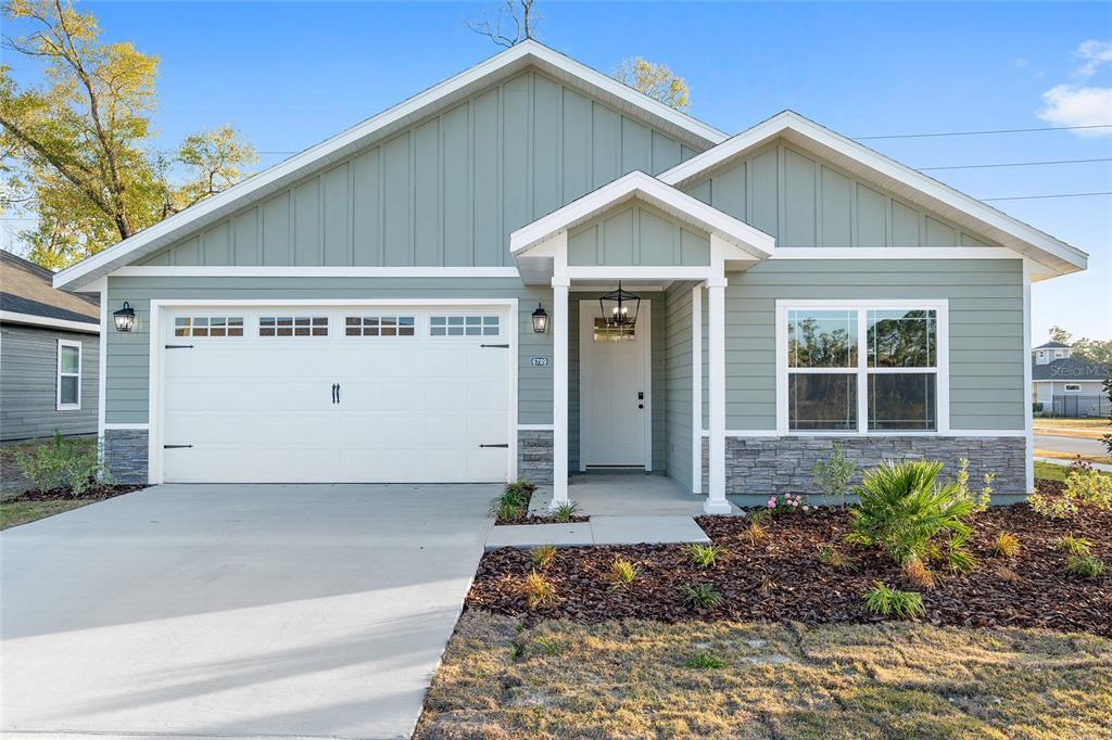 6719 Southwest 10th Lane Gainesville, FL 32607 - Photo 1 of 1 a view of a house with a yard