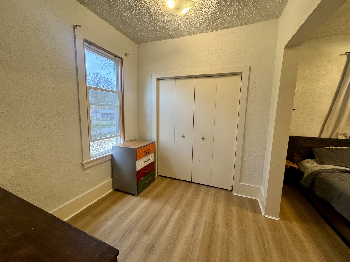 616 Northwest 2nd Avenue Aledo, IL 61231 - Photo 17 of 26 a living room with furniture and a window