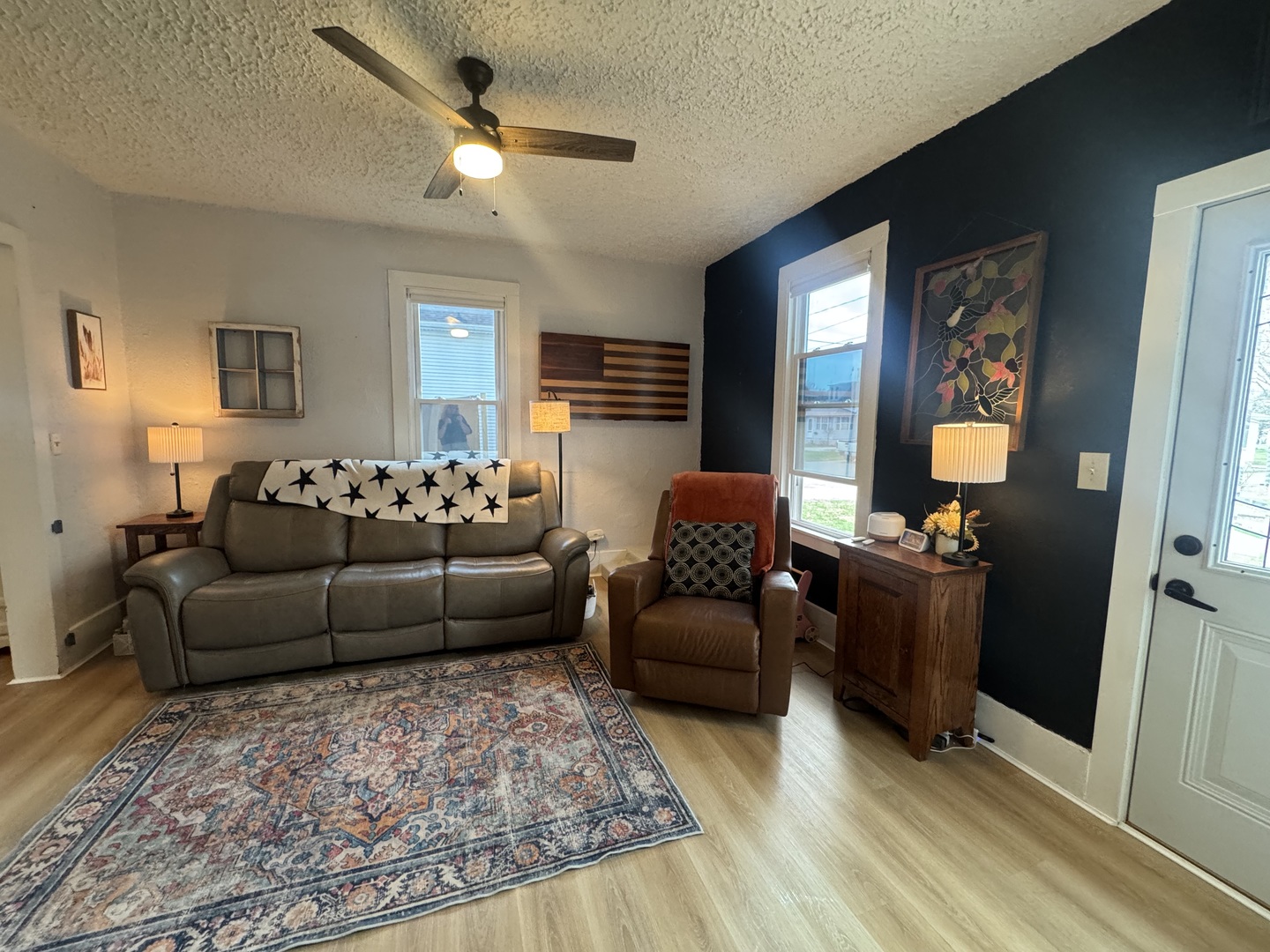 616 Northwest 2nd Avenue Aledo, IL 61231 - Photo 2 of 26 a living room with furniture and a flat screen tv