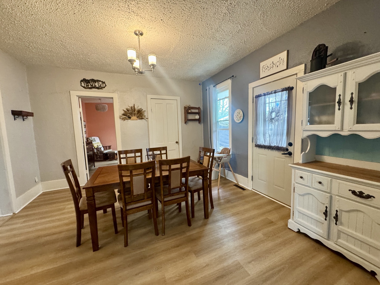 616 Northwest 2nd Avenue Aledo, IL 61231 - Photo 6 of 26 a view of a dining room with furniture and wooden floor