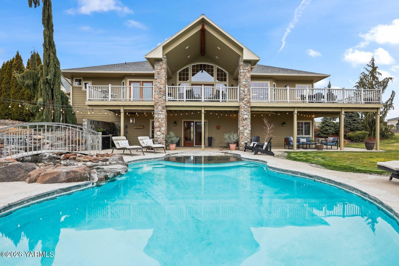 11105 Zier Road Yakima, WA 98908 - Photo 2 of 65 a view of a building with a swimming pool