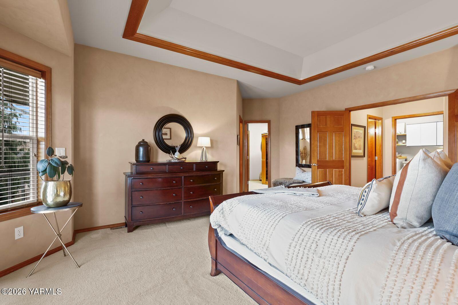 11105 Zier Road Yakima, WA 98908 - Photo 29 of 65 a bedroom with a bed and a dresser