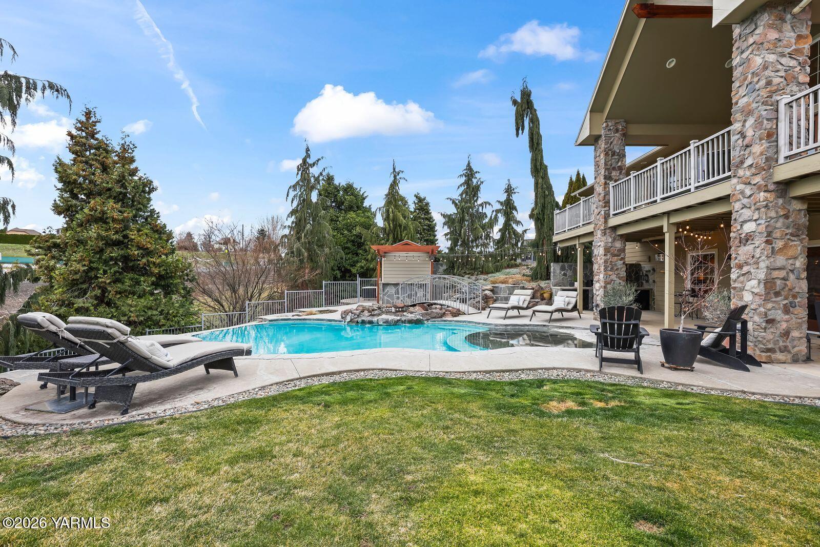 11105 Zier Road Yakima, WA 98908 - Photo 54 of 65 a view of a swimming pool with a patio