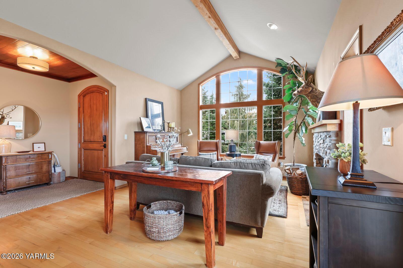 11105 Zier Road Yakima, WA 98908 - Photo 10 of 65 a dining room with furniture a window and wooden floor