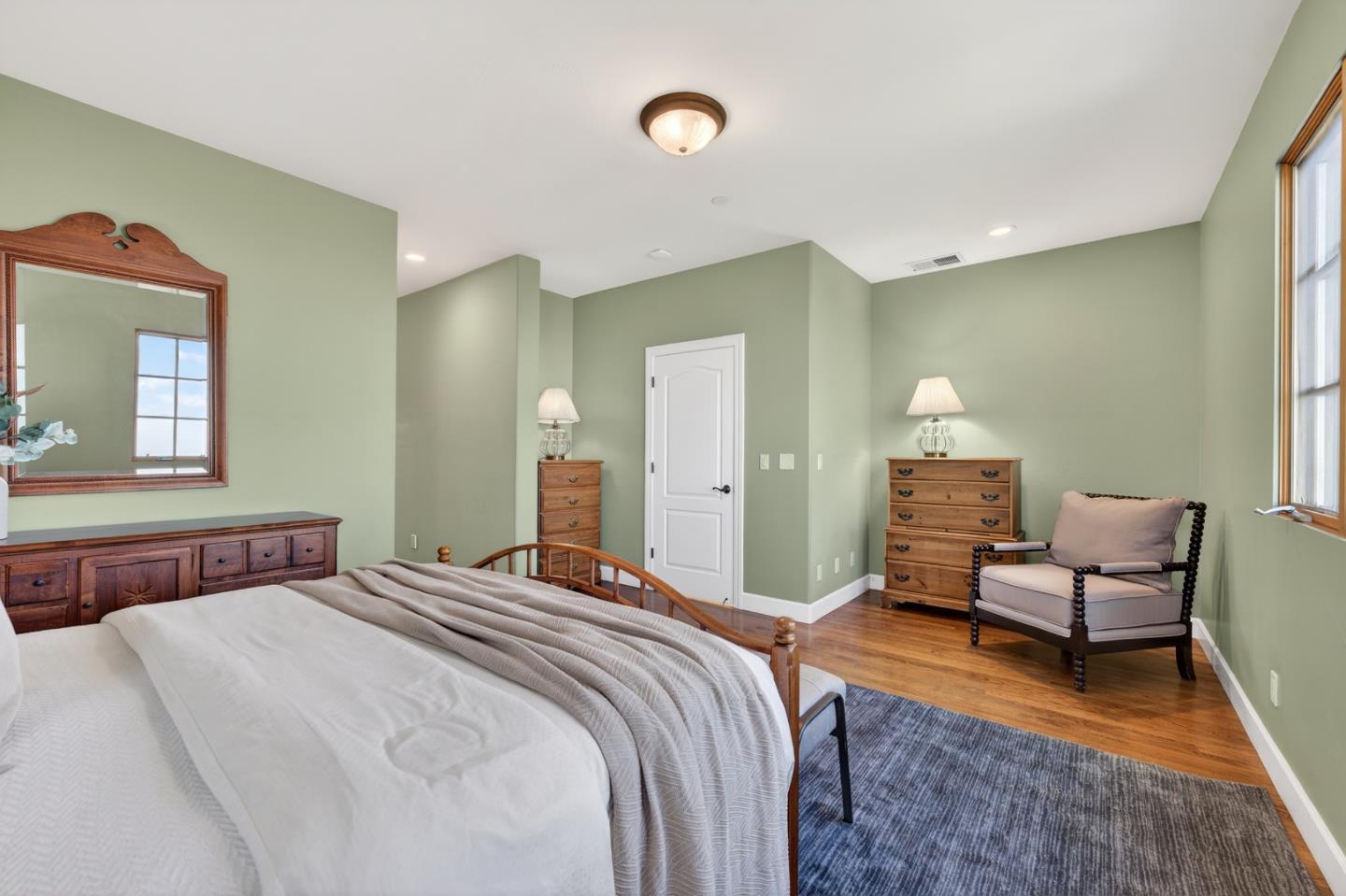 17599 Montebello Road Cupertino, CA 95014 - Photo 48 of 83 a bedroom with a bed and a couch
