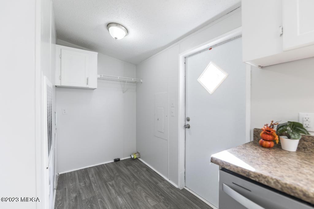 208 Colonial Drive Byron, GA 31008 - Photo 17 of 38 a view of kitchen cabinets and wooden floor