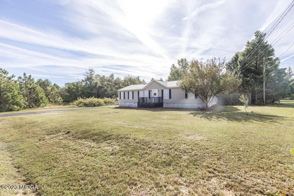 208 Colonial Drive Byron, GA 31008 - Photo 3 of 38 a view of a house with a yard