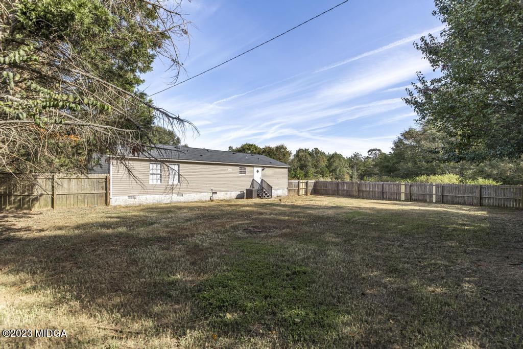 208 Colonial Drive Byron, GA 31008 - Photo 37 of 38 a view of back yard of the house