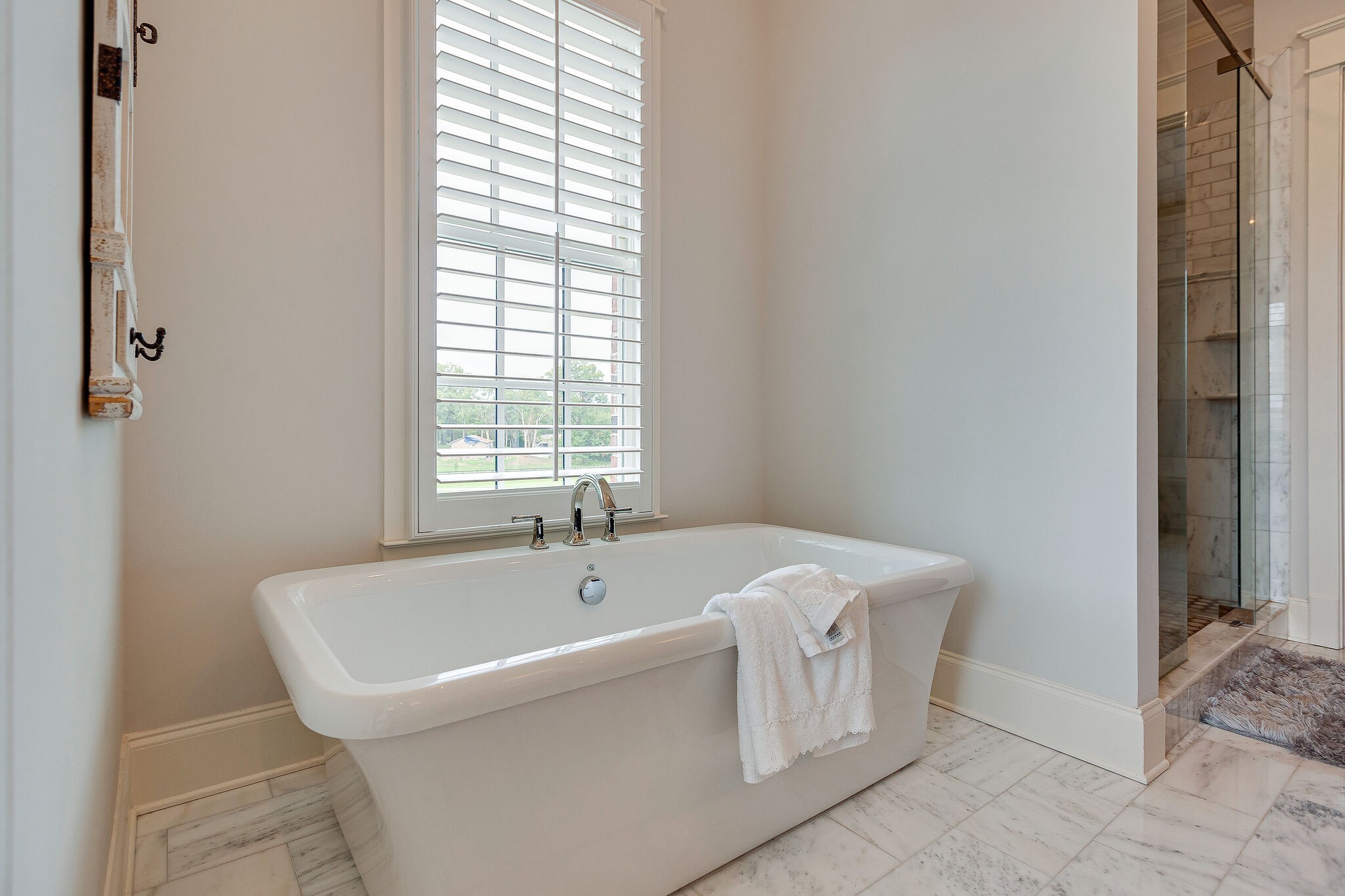 4114 Trinity Road College Grove, TN 37046 - Photo 22 of 49 a spacious bathroom with a bathtub and shower