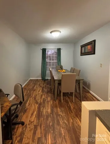 a workspace with wooden floor